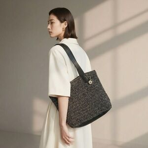 The Sak handbag handwoven knit - known for durability and style.